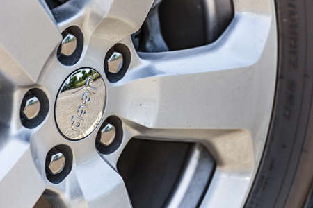 RAVENNA, ITALY - JUNE 30, 2018: Dirt and dust cover the JEEP logo on an alloy wheel
