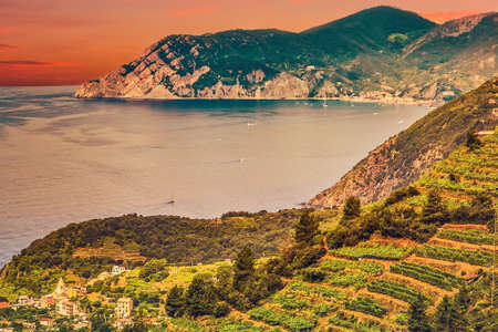 cloudy sky of sunset on Ligurian coast in Italyの写真素材