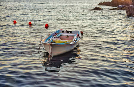 moored boat in quiet sea background