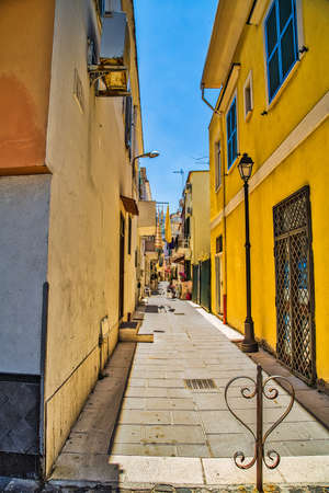 narrow alley of colorful houses in typical village in Ischia islandsの写真素材
