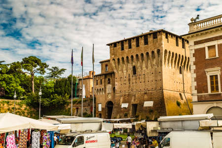 LUGO (RA), ITALY - JUNE 5, 2013: people are going for shopping in stalls of weekly market