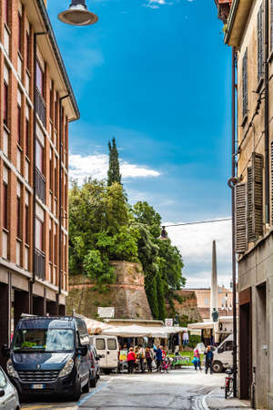LUGO (RA), ITALY - JUNE 5, 2013: people are going for shopping in stalls of weekly market