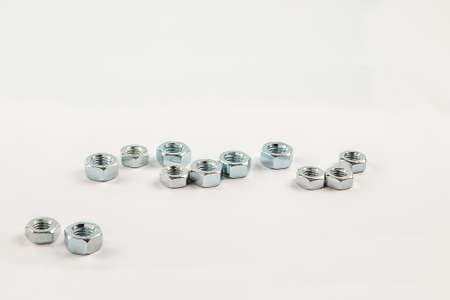 stainless steel nuts isolated on white background