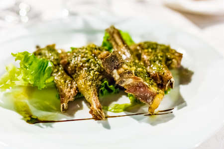 Grilled chops of Castrated lamb served on a bed of saladの写真素材
