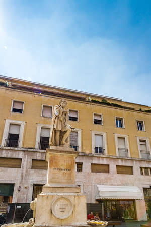 PARMA, ITALY â AUGUST 23, 2018: Tourists are resting near Parmigianino statue in historic square of Parmaのeditorial素材