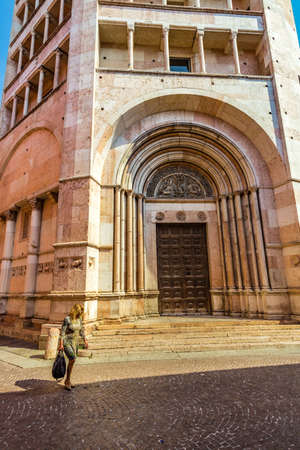 PARMA, ITALY â AUGUST 23, 2018: Tourists are walking and enjoying the charming historic streets of Parma, elegant town in the Emilia-Romagna region of Northern Italyのeditorial素材