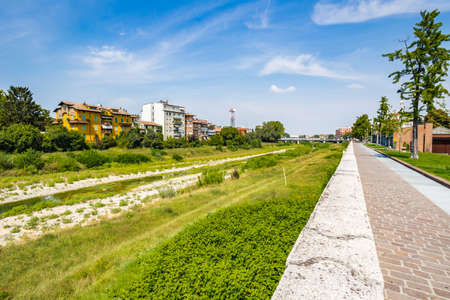 ancient buildings along creek in Parma, elegant town in the Emilia-Romagna region of Northern Italy