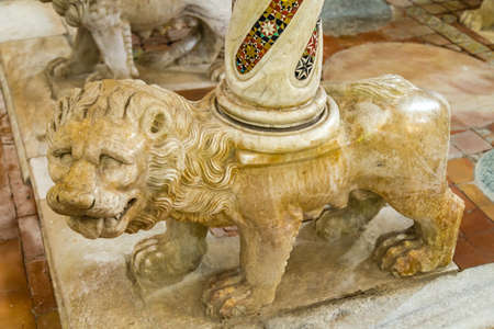 RAVELLO (SA), ITALY - AUGUST 29, 2018: sunlight illuminating interiors of Cathedral in Ravello, statue of lionのeditorial素材
