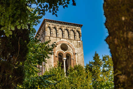 green frame on ancient belfry in Italyの写真素材