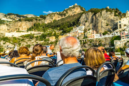 POSITANO (SA), ITALY - AUGUST 30, 2018: tourists are enjoying a boat tour on Amalfi coastのeditorial素材