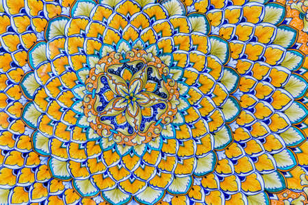 Ravello (SA), ITALY - AUGUST 29, 2018: Amalfi style ceramic plates on sale in typical shop