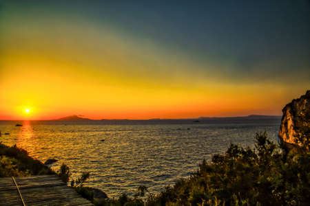 emotional sunset on Sorrentine Peninsula in Italyの写真素材