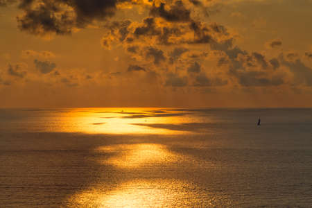 sunset on open sea in Italyの写真素材