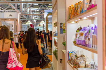 BOLOGNA (ITALY), SEPTEMBER 10, 2018: Visitors are walking in the lanes and visiting the stands of the exhibitors at SANA, international exhibition of organic and natural productsのeditorial素材