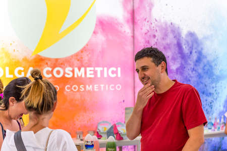 BOLOGNA (ITALY), SEPTEMBER 10, 2018:  Visitors are visiting a stand and asking exhibitor about the...