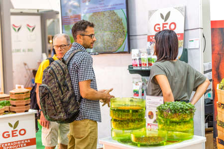 BOLOGNA (ITALY), SEPTEMBER 10, 2018:  Visitor is visiting a stand and asking exhibitor about the products at SANA, international exhibition of organic and natural productsのeditorial素材