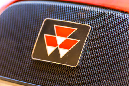LUGO, ITALY - September 11, 2018: light enlightening MASSEY FERGUSON logo on a tractor bodyのeditorial素材
