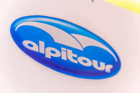 LUGO (RA), ITALY â€“ SEPTEMBER 11, 2018: Dust and dirt covering the ALPITOUR logo on signboard