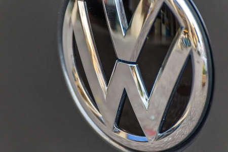 LUGO, ITALY - September 11, 2018: light enlightening Volkswagen logo on a car body