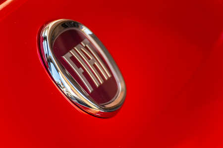 LUGO, ITALY - September 11, 2018: light enlightening FIAT logo on a car bodyのeditorial素材