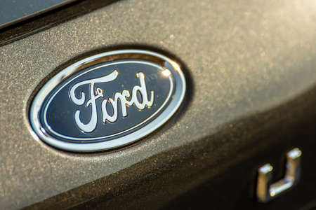 LUGO, ITALY - September 11, 2018: light enlightening FORD logo on a car body