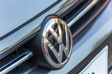 LUGO, ITALY - September 11, 2018: light enlightening Volkswagen logo on a car bodyのeditorial素材