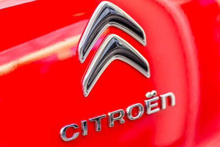 LUGO, ITALY - September 11, 2018: light enlightening CITROEN logo on a car bodyのeditorial素材