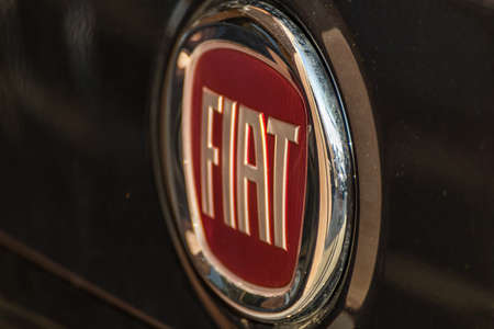 LUGO, ITALY - September 11, 2018: light enlightening FIAT logo on a car body