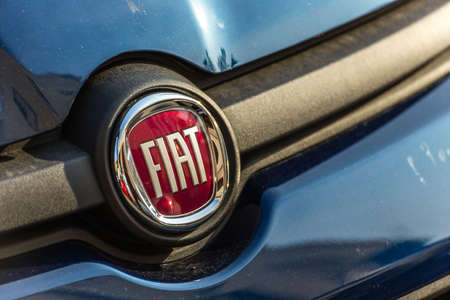 LUGO, ITALY - September 11, 2018: light enlightening FIAT logo on a car bodyのeditorial素材