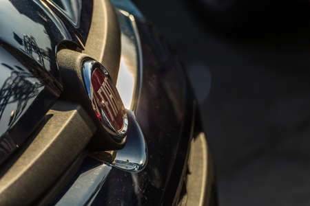 LUGO, ITALY - September 11, 2018: light enlightening FIAT logo on a car bodyのeditorial素材