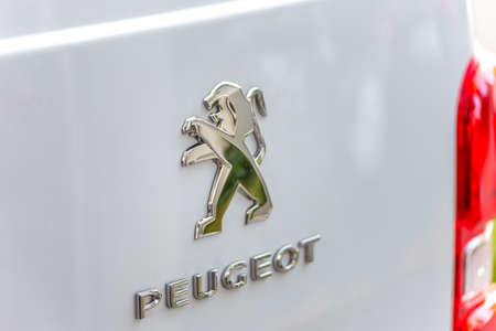 LUGO, ITALY - September 11, 2018: light enlightening Peugeot logo on a car bodyのeditorial素材