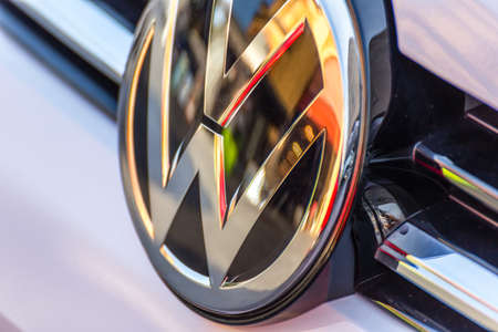LUGO, ITALY - September 11, 2018: light enlightening Volkswagen logo on a car body