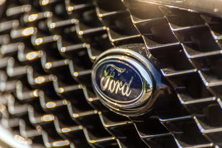LUGO, ITALY - September 11, 2018: light enlightening FORD logo on a car bodyのeditorial素材