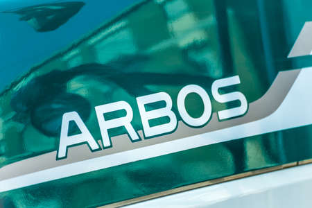 LUGO, ITALY - September 11, 2018: light enlightening ARBOS logo on a tractor bodyのeditorial素材