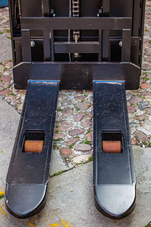 closeup of black Forklift Forks