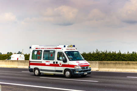 FAENZA (RA), SEPTEMBER 15, 2018: The ambulance moves quickly on the highwayのeditorial素材