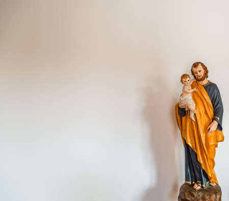 Saint Joseph holding Baby Jesus