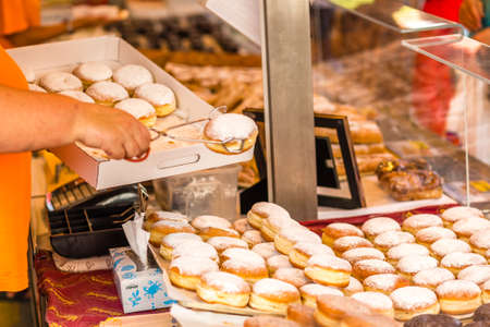 CERVIA (RA), ITALY - SEPTEMBER 16, 2018: people selling sell Austrian Sweets at European Market, street exhibition of typical products and flavours from Europeのeditorial素材