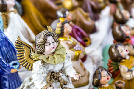 CESENA (FC), ITALY - SEPTEMBER 16, 2018: lights enlightening singing angels at antiques fair in...