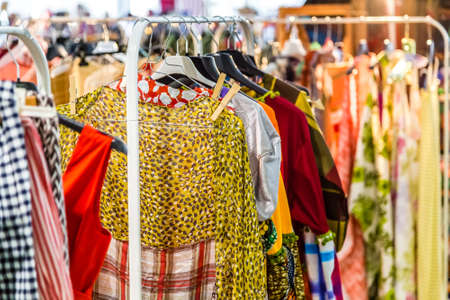 CESENA (FC), ITALY - SEPTEMBER 16, 2018: lights enlightening vintage dresses at antiques fair in Cesenaのeditorial素材