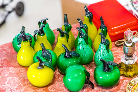 CESENA (FC), ITALY - SEPTEMBER 16, 2018: lights enlightening Porcelain fruit at antiques fair in Cesenaのeditorial素材