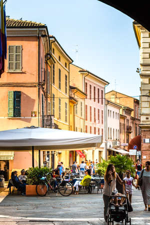 RAVENNA, ITALY - SEPTEMBER 19, 2018: tourists enjoying meal in historical center of Ravennaのeditorial素材