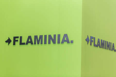 BOLOGNA (ITALY), SEPTEMBER 26, 2018: light is enlightening FLAMINIA logo at CERSAIE, international exhibition of ceramic tile and bathroom furnishingsのeditorial素材