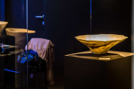 BOLOGNA (ITALY), SEPTEMBER 28, 2018: light is enlightening luxurious washbasin at CERSAIE, international exhibition of ceramic tile and bathroom furnishingsのeditorial素材