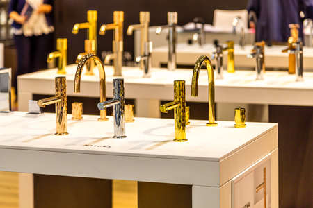BOLOGNA (ITALY), SEPTEMBER 28, 2018: light is enlightening luxurious faucets at CERSAIE, international exhibition of ceramic tile and bathroom furnishingsのeditorial素材