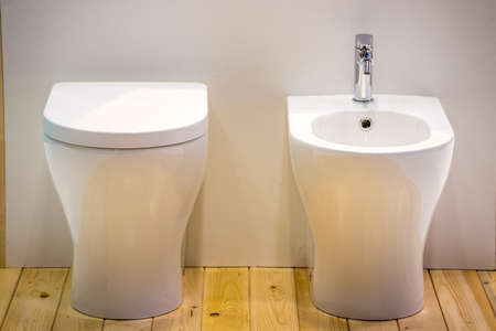 white toilet bowl and bidetのeditorial素材