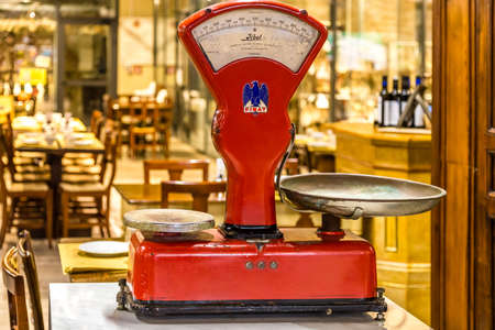 BOLOGNA, ITALY - OCTOBER 2, 2018: lights are enlightening Old Mechanical Scales at FICO EATALY...