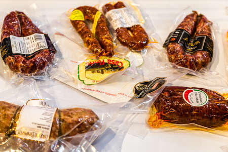 BOLOGNA, ITALY - OCTOBER 2, 2018: lights are enlightening salami in vacuum at FICO EATALY WORLD, the largest agri-food park in the worldのeditorial素材