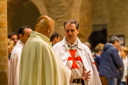 FORLI, ITALY - OCTOBER 26, 2018: Catholic Templar Knights participate in the ritual of Holy Mass. On the left Magister Mauro Giorgio Ferrettiのeditorial素材