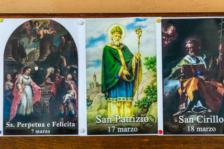 SAN BERNARDINO (RA), ITALY â€“ OCTOBER 31, 2018: The priest put on the entrance of the church...